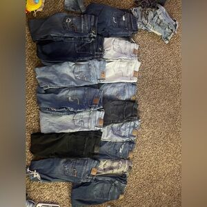 16 pairs of American eagle jeans. All fit like size 0